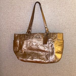 Coach purse rose gold